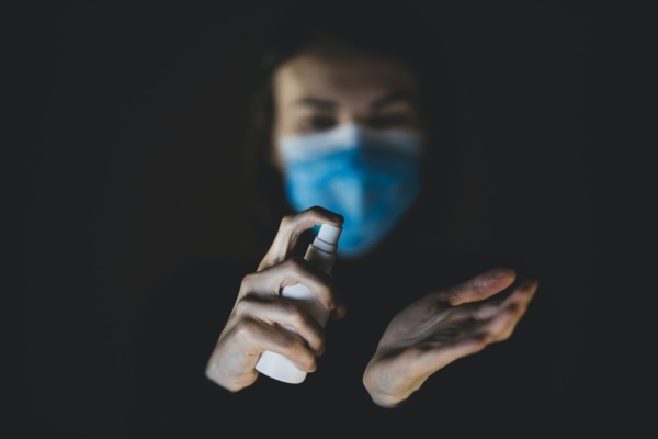 person holding black and white device